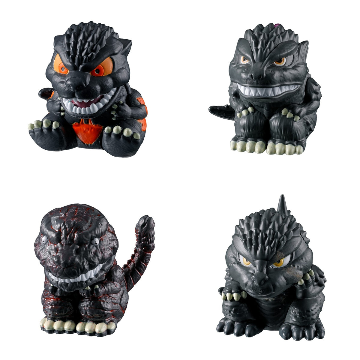 Complete set of four Godzilla Machiboke deformed figures: 1995, 1999, 2016 and 2023