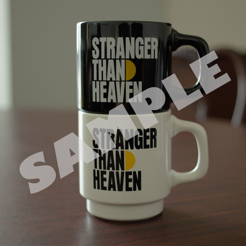 STRANGER THAN HEAVEN black and white logo mugs stacked together