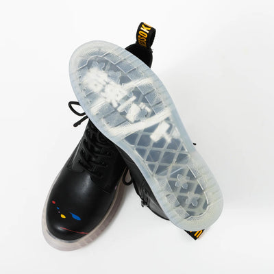 Bocchi The Rock! SuperGroupies Kessoku Band boots: Pair displayed with the band-logo sole raised.