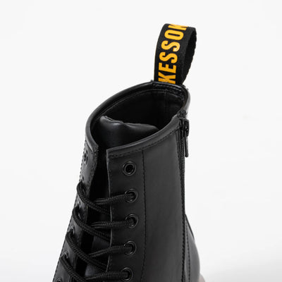 Bocchi The Rock! SuperGroupies Kessoku Band boots: Close-up of collar, laces and yellow heel pull tab.