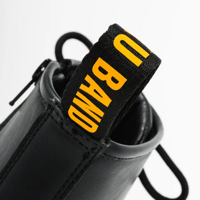 Bocchi The Rock! SuperGroupies Kessoku Band boots: Yellow heel tab with BAND lettering.