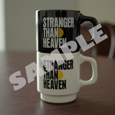 STRANGER THAN HEAVEN black and white logo mugs stacked together