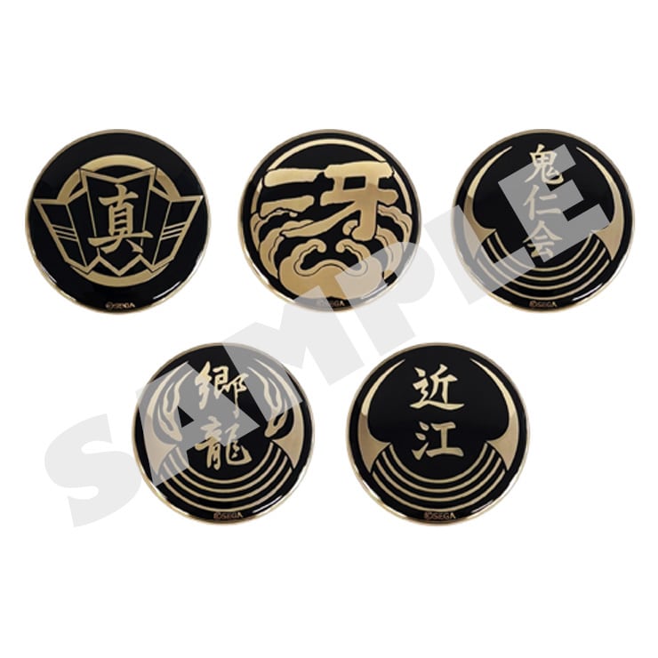 All five Yakuza 20th Anniversary gold-plated emblem badge designs in Volume 2